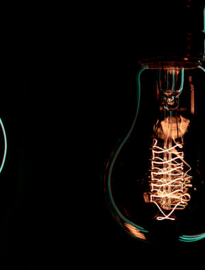 Silhouette of a glowing lamps in the dark close up.